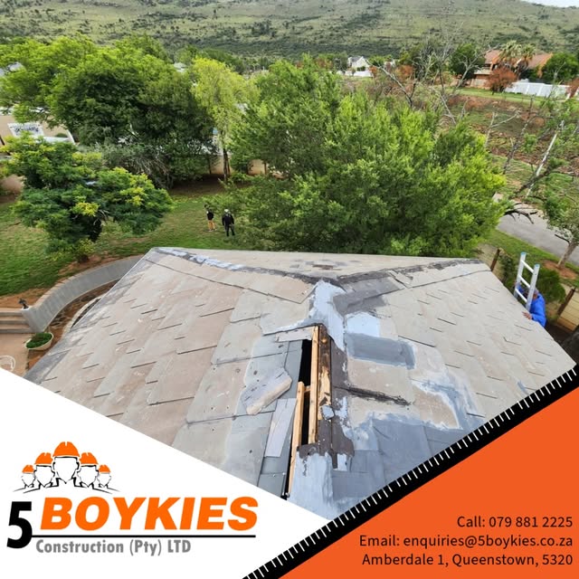 Roof covering lifted and waterproofing coat applied along the ridge